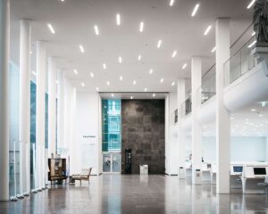 large hotel lobby business center with computers in daylight